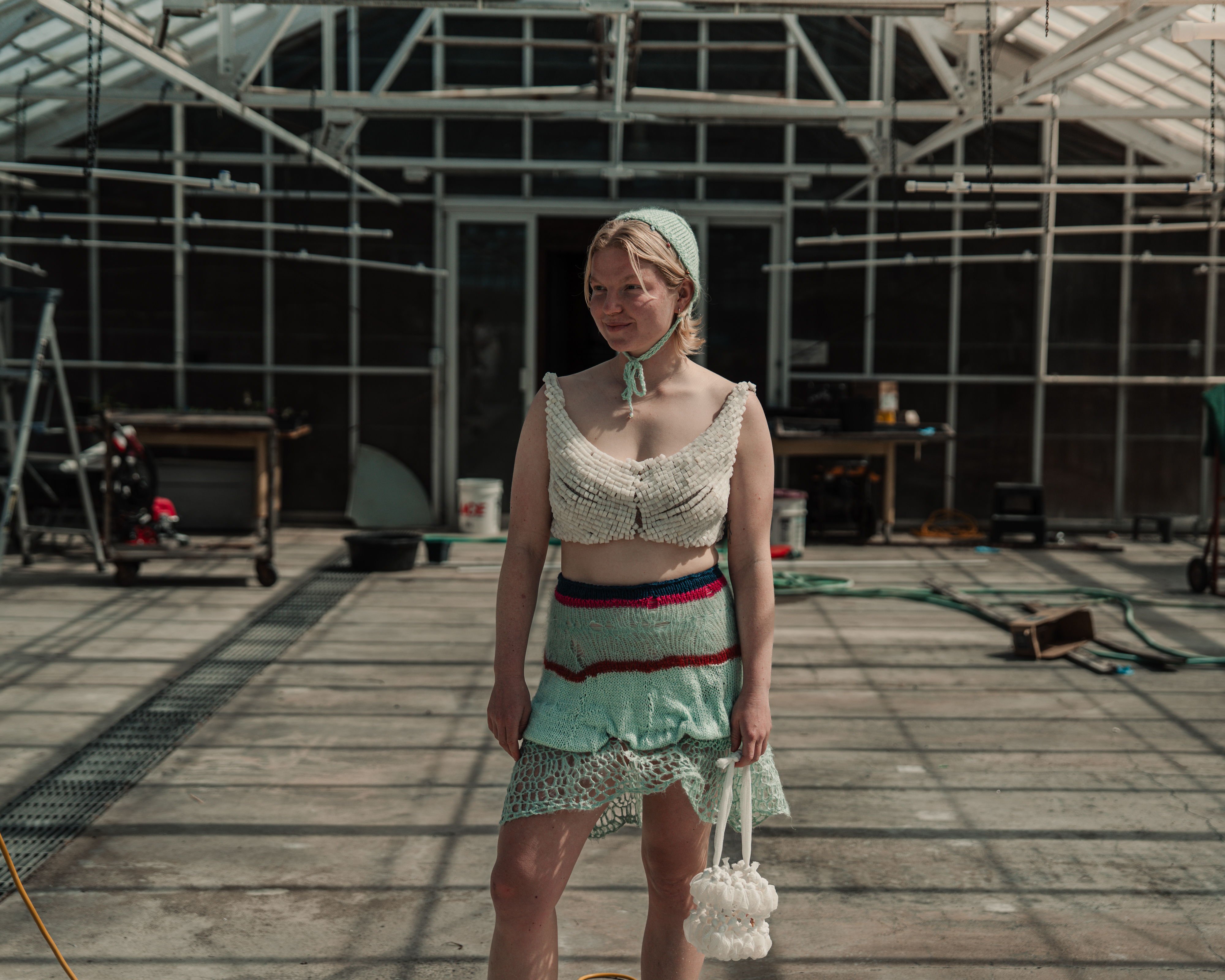 Grace wearing agar-knit skirt with bioball top