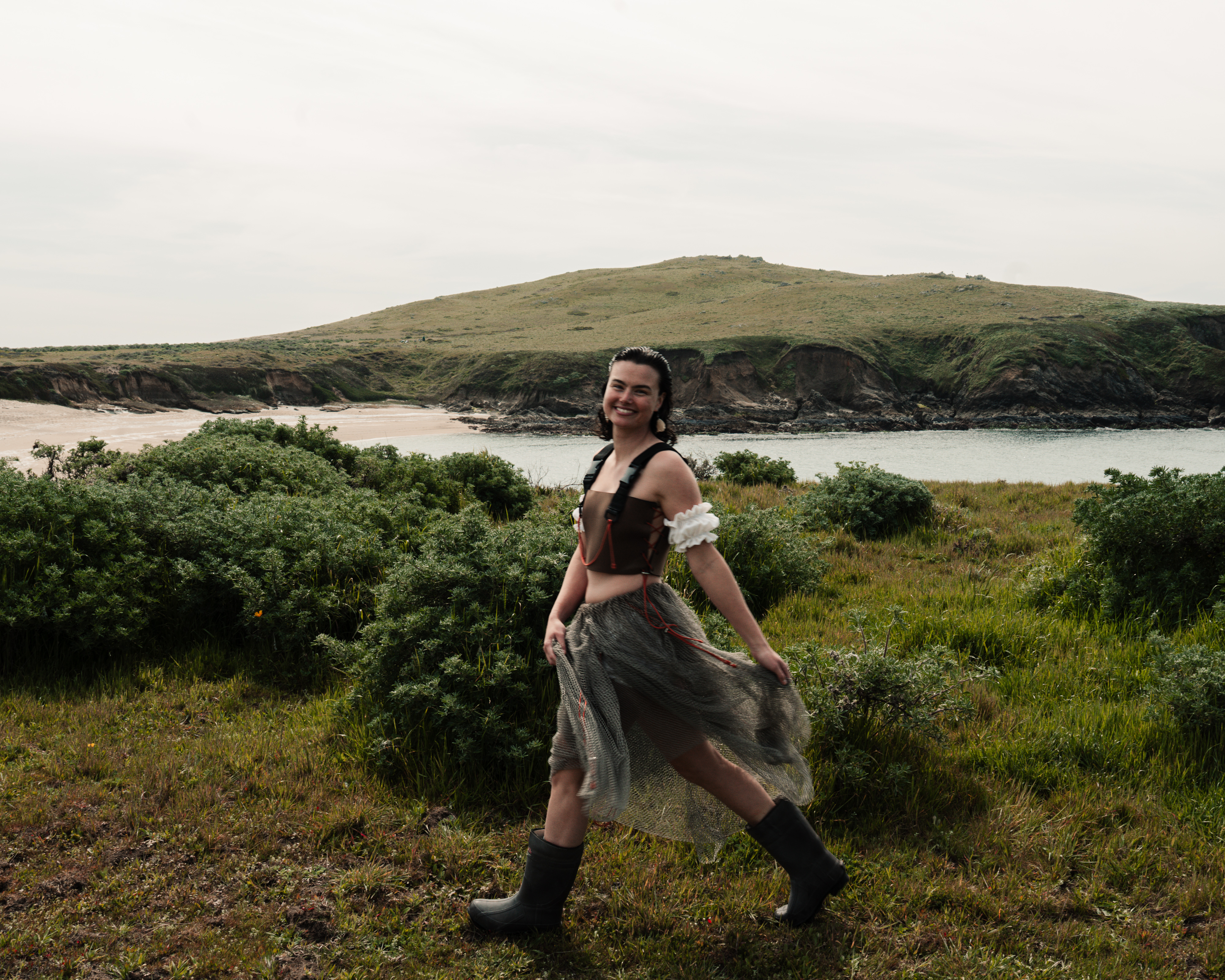 Kyndall wearing net skirt with neoprene top